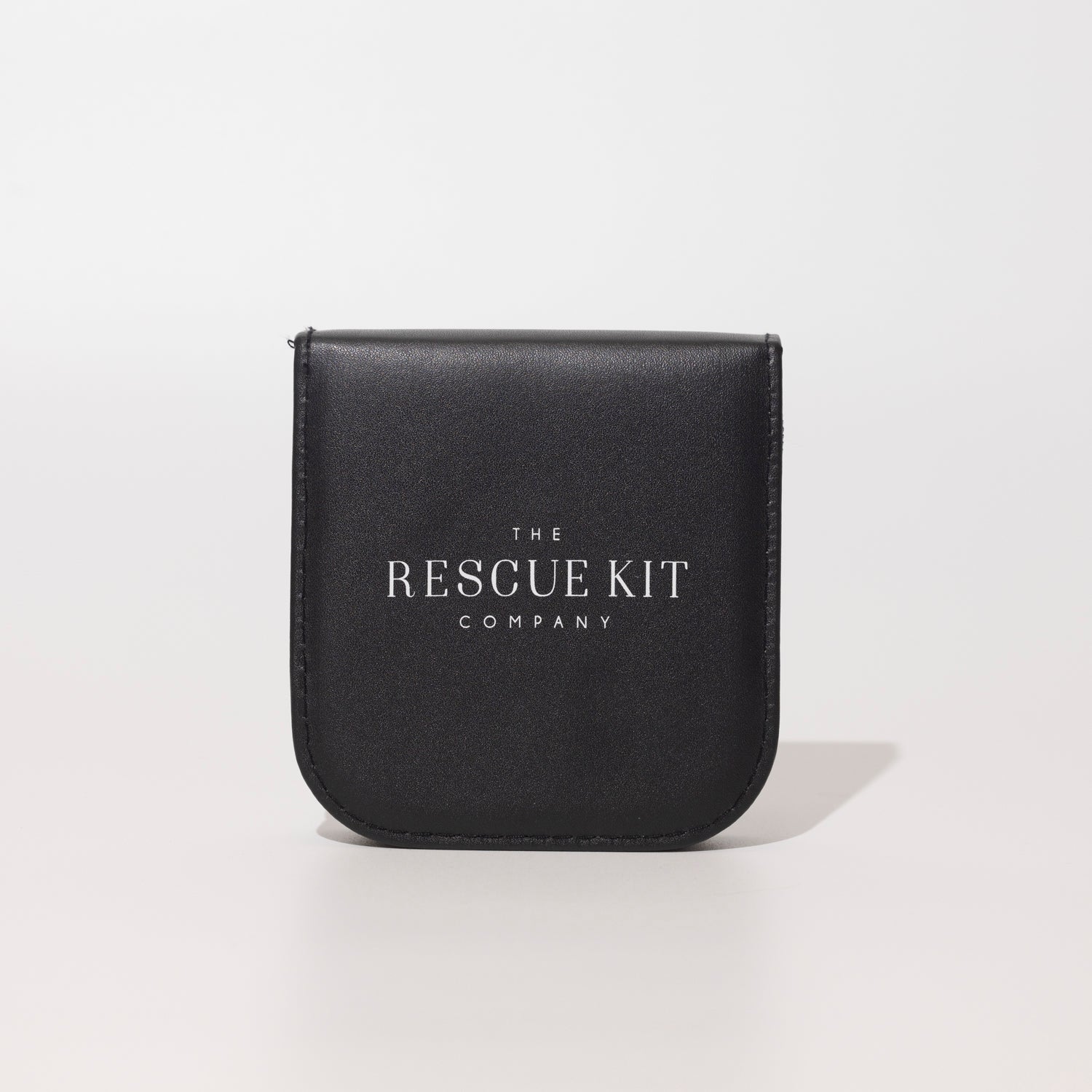 Travel Sewing Kit by The Rescue Kit Company. Black with white logo.