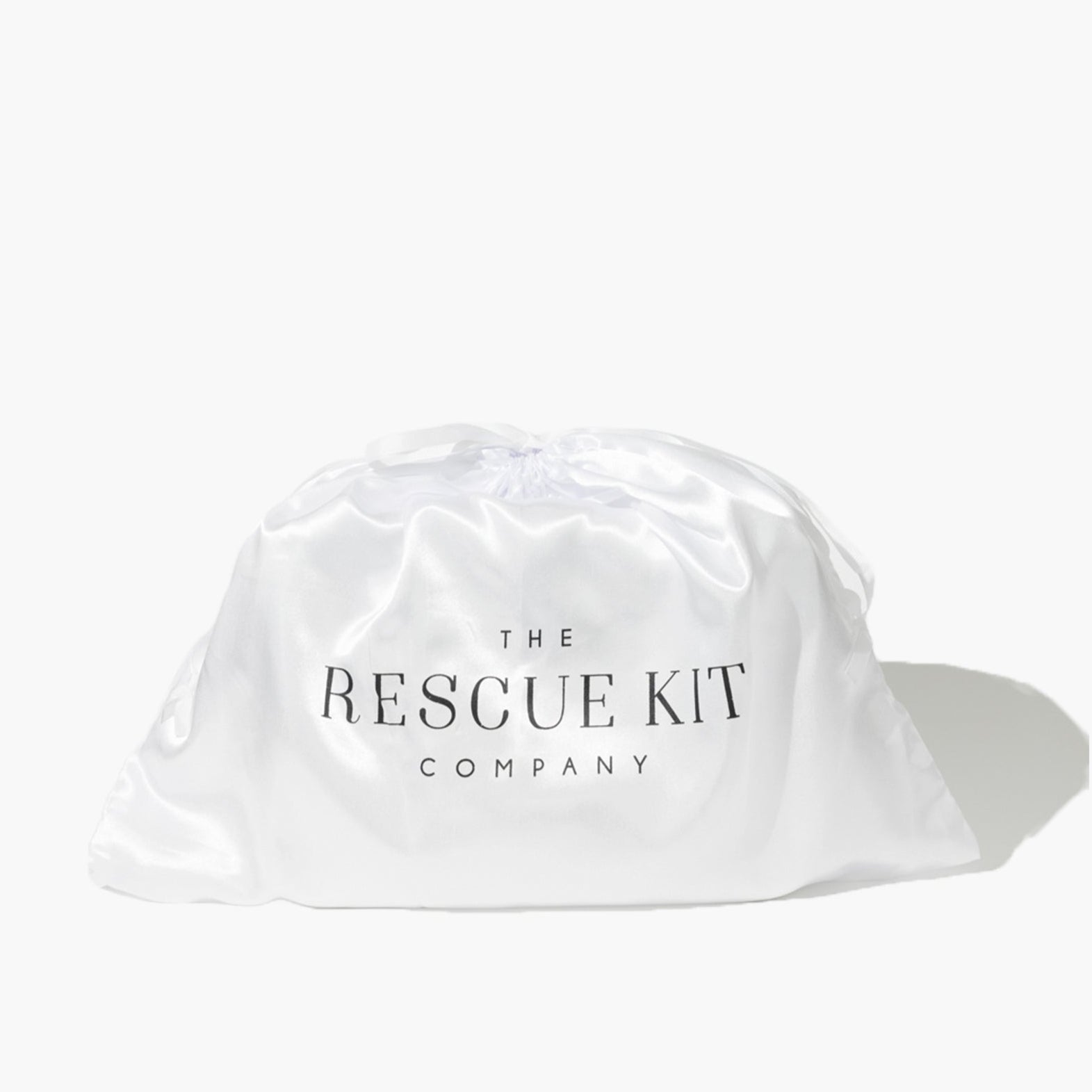White satin dust bag with 'The Rescue Kit Company' logo on a white background