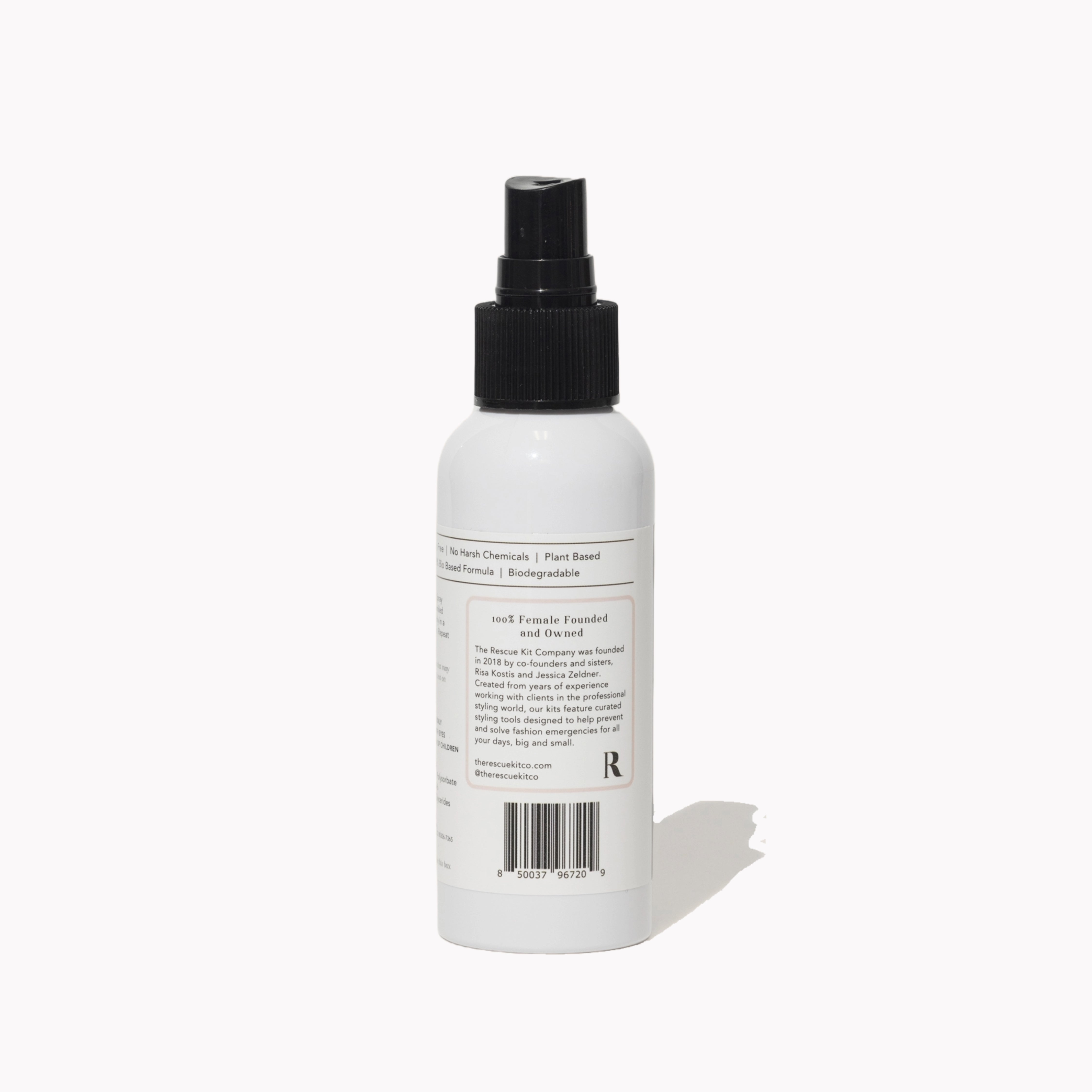 Wrinkle Release Spray by The Rescue Kit Company, white bottle, black top. Back label shown.