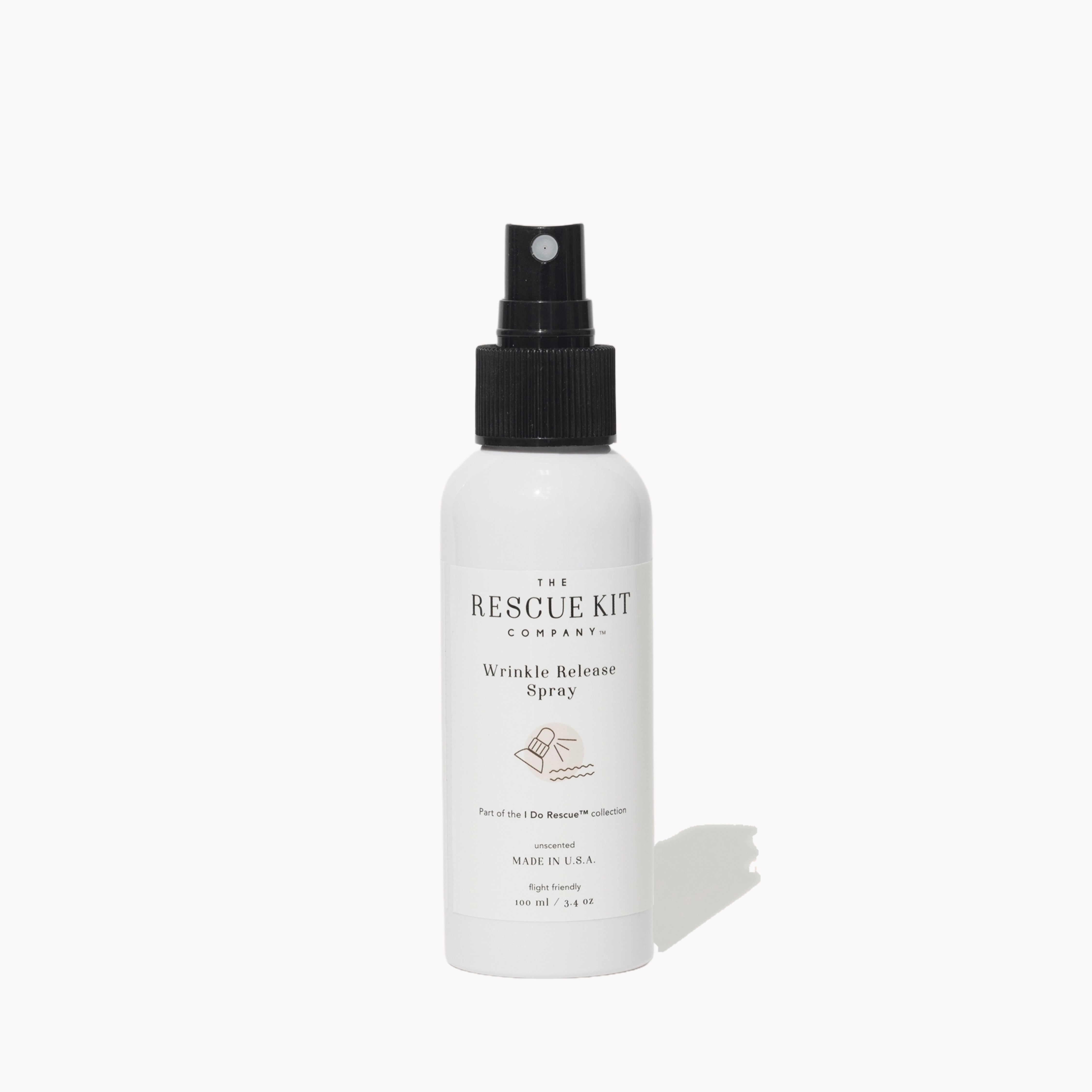 Wrinkle Release Spray by The Rescue Kit Company, white bottle, black top.