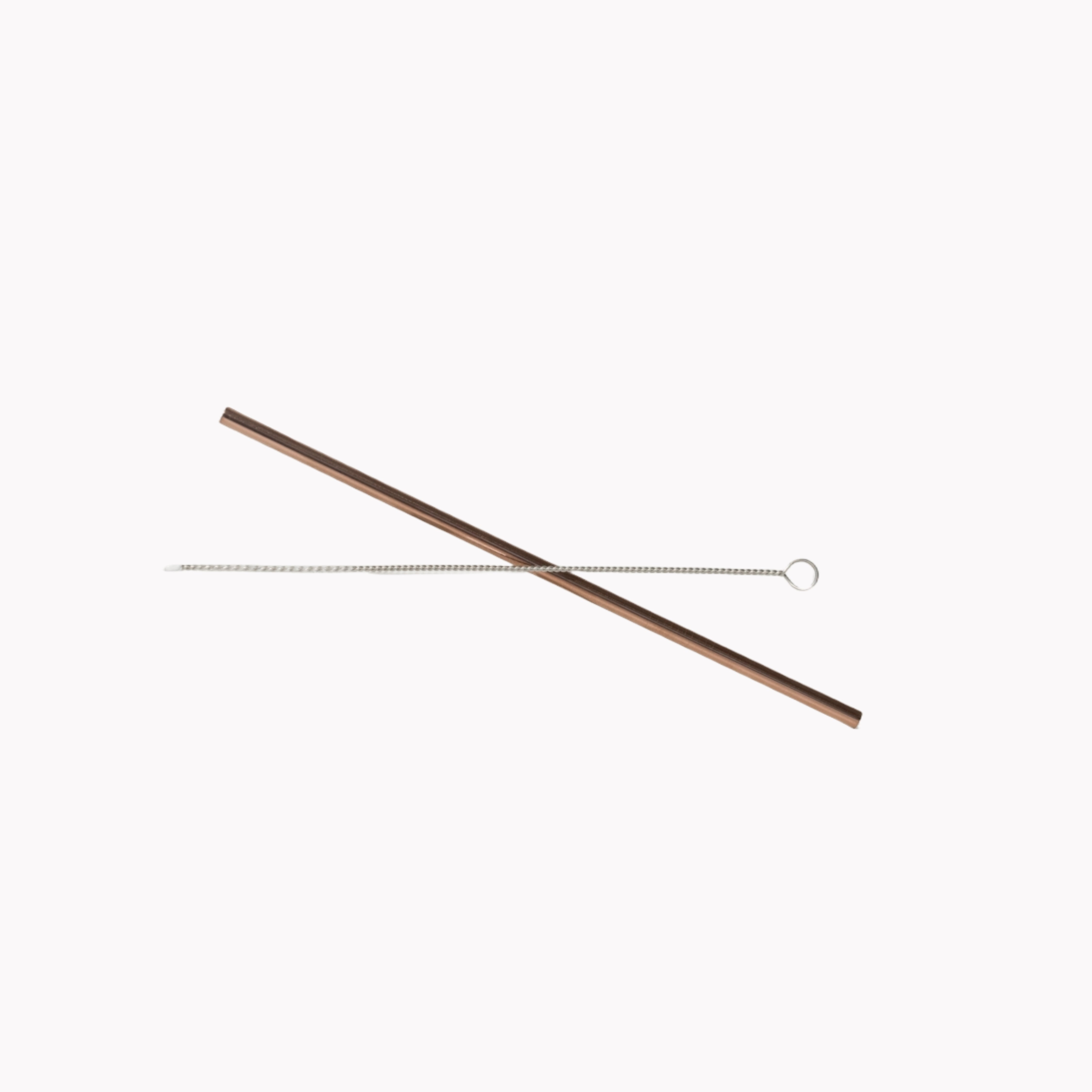 Reusable rose gold metal straw with cleaning brush.