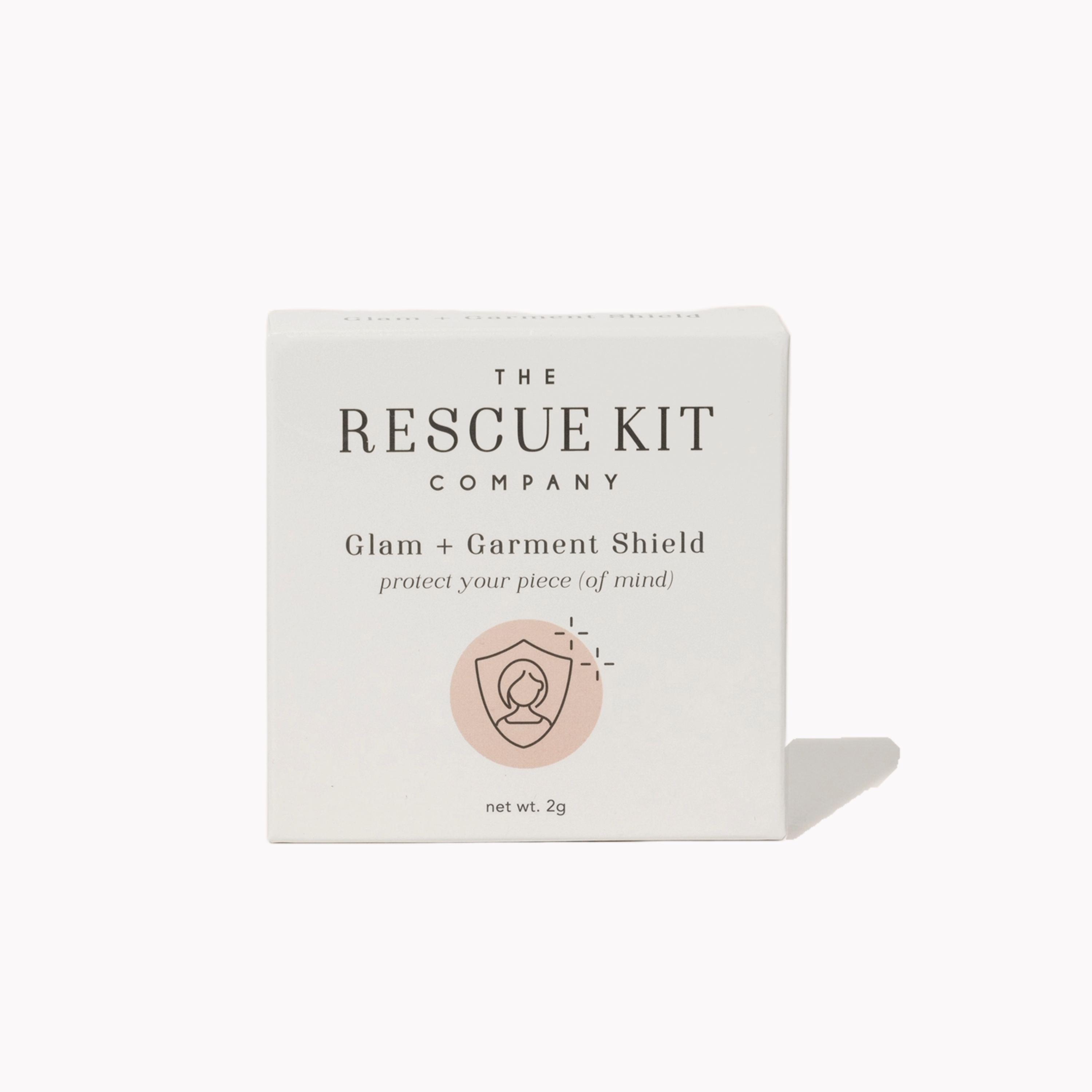 Product packaging for 'Glam + Garment Shield' by The Rescue Kit Company on a white background.