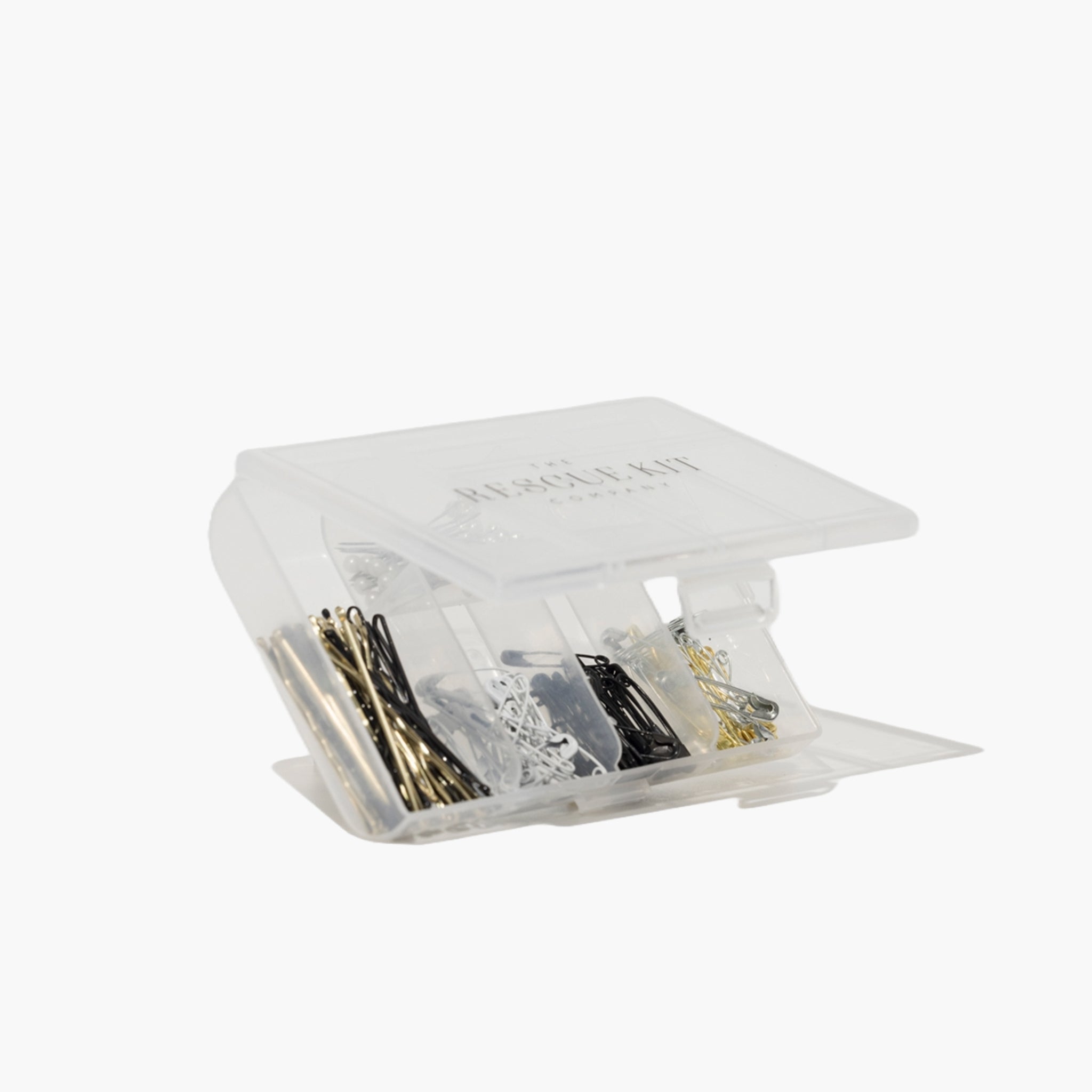 Hair + Pin Kit in a clear plastic case on a white background