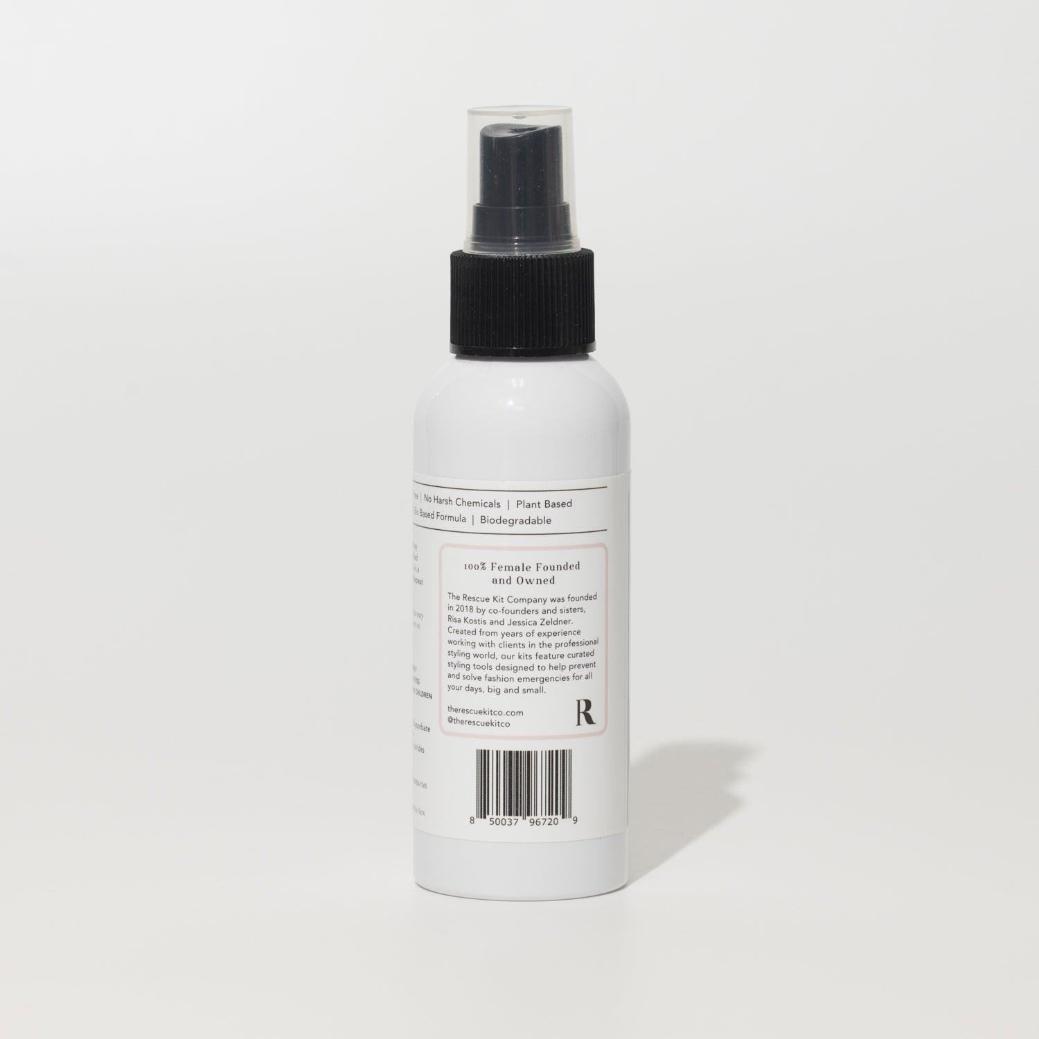 Wrinkle Release Spray by The Rescue Kit Company, white bottle, black top. Back label shown.