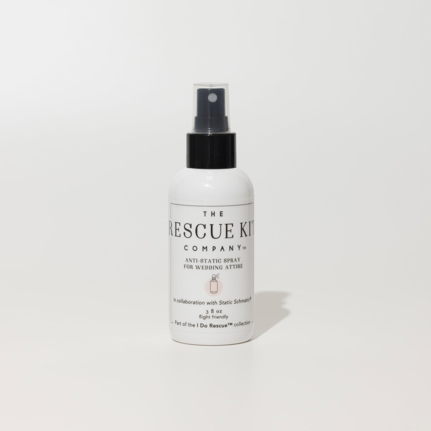 The Rescue Kit Company Anti-Static Spray bottle, designed for wedding attire, featuring a black spray top and minimalist label—flight-friendly and stylist-approved.