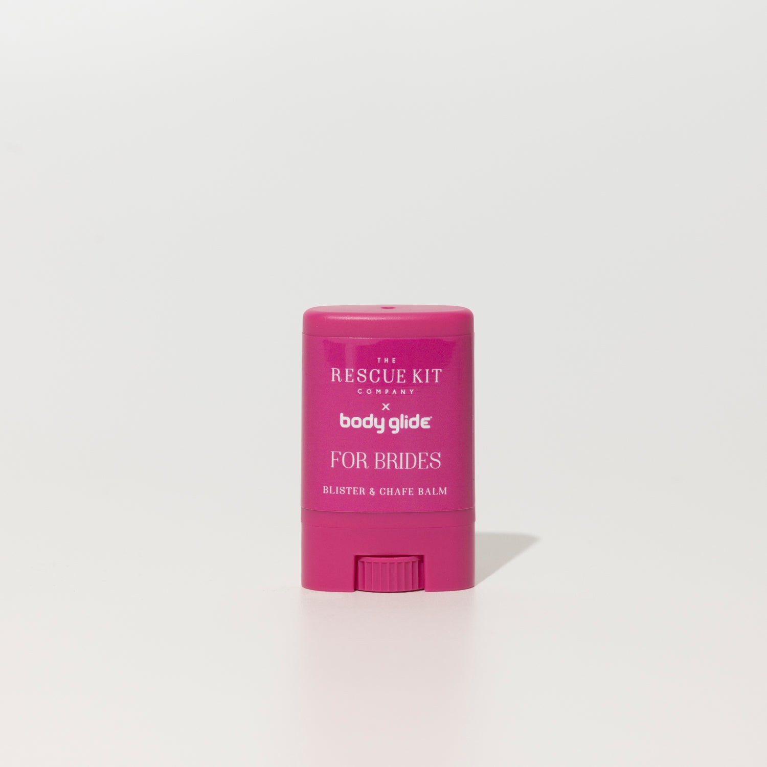 The Rescue Kit Company x Body Glide blister and chafe balm for brides, in a bright pink twist-up tube, designed to prevent discomfort on the big day.