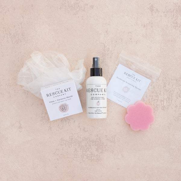 The Event Trio by The Rescue Kit Company containing the Glam + Garment Shield, Anti-Static Spray for Wedding Attire, and the Deodorant Removing Sponge.