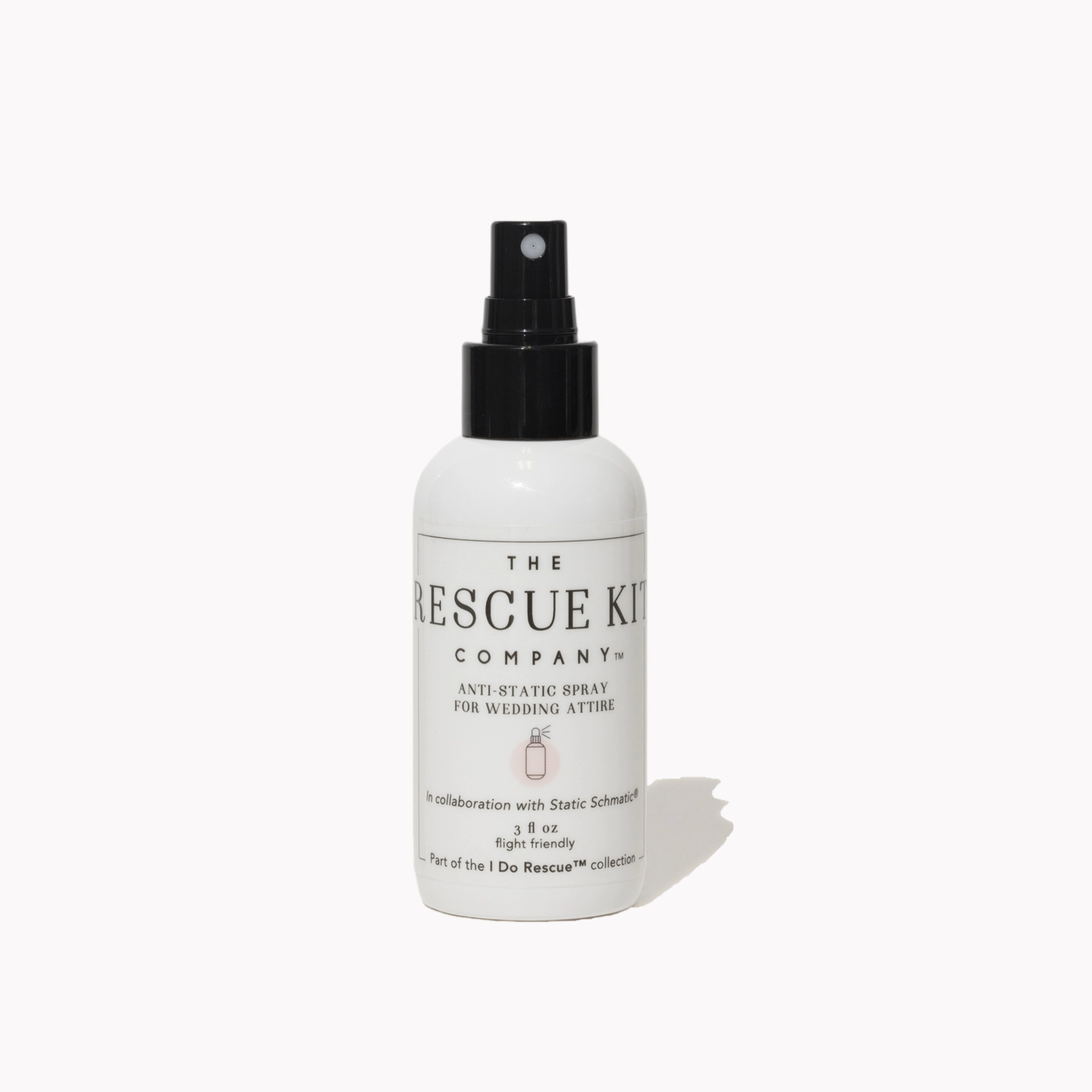 The Rescue Kit Company Anti-Static Spray bottle, designed for wedding attire, featuring a black spray top and minimalist label—flight-friendly and stylist-approved.